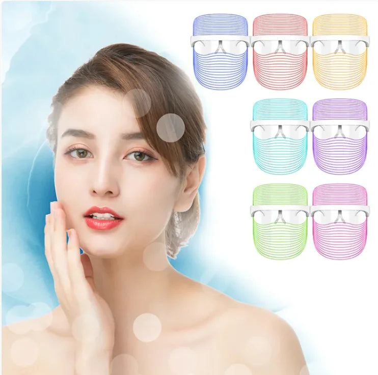 Woman with a clear face mask and colorful face mask options on a light blue background